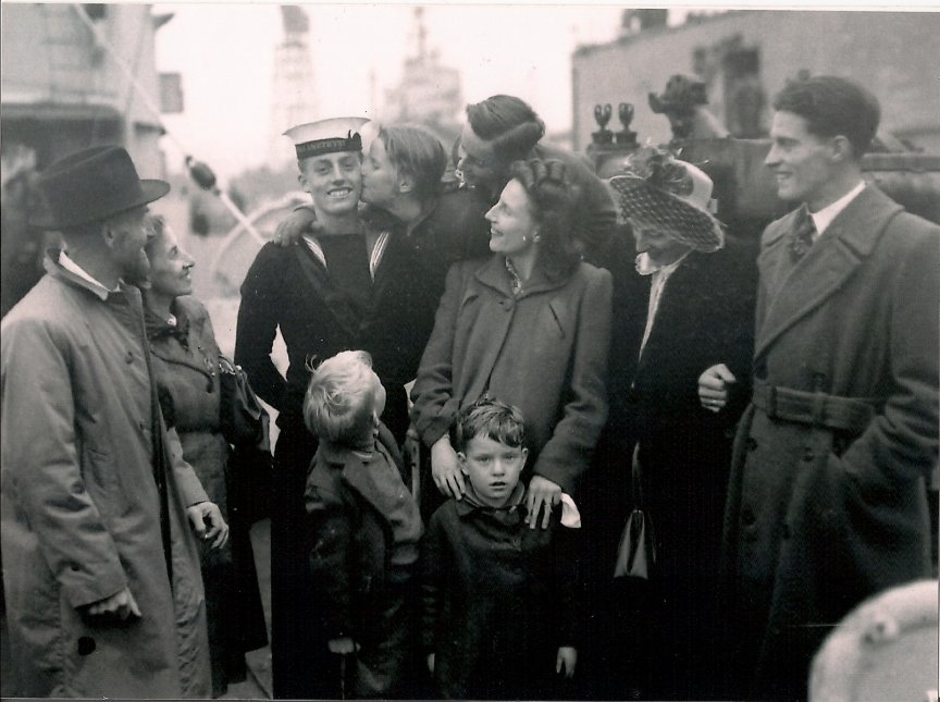 Sid Horton with his family, on his return home. Sid Horton with his family, on his return home.