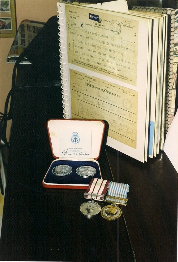 Sydney's medals,with the famous telegram, and the return home.