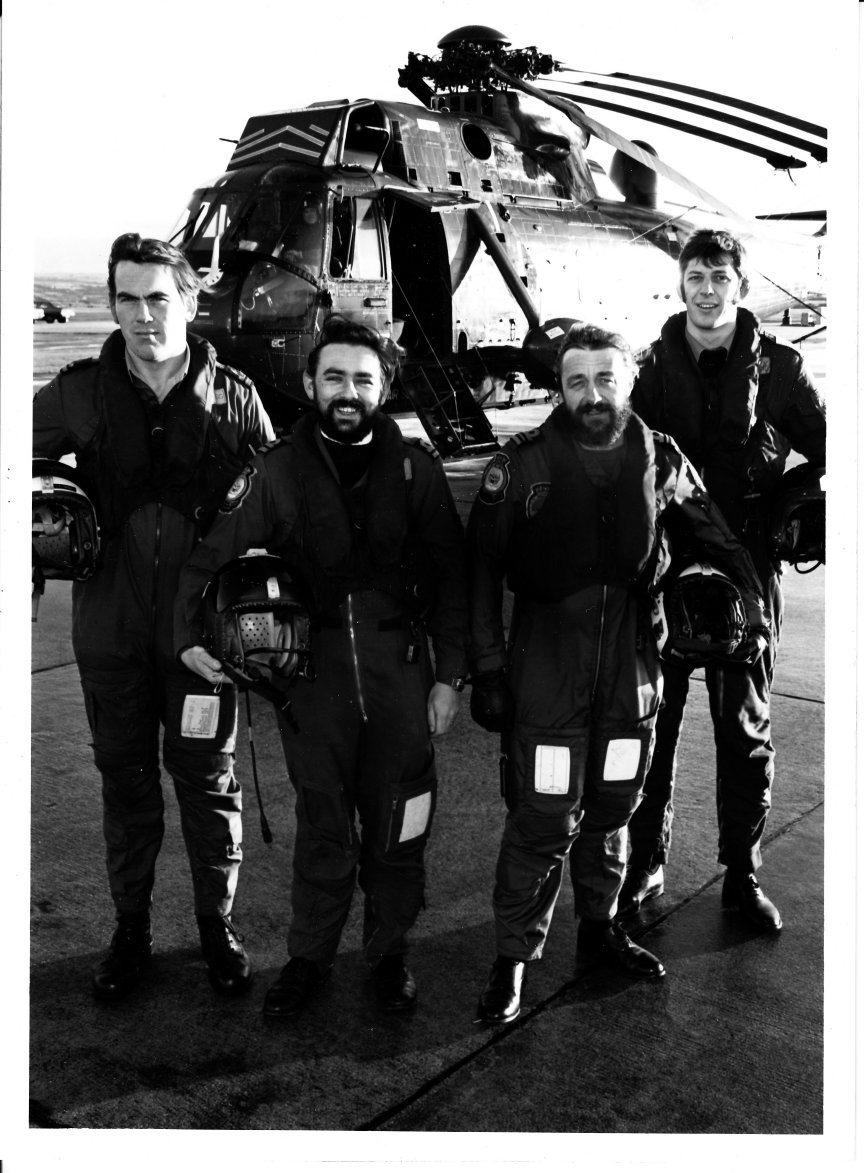 Lt Tony Hogg First Pilot, Lt Larry Jeram- Croft Second pilot, Lt Cdr Mike Norman Observer and a/c Captain, and Leading Aircrewman Jan Folland, Winch Operator. Leading Medical Attendant Brian Steele is not present. He was a volunteer from the sick bay at RNAS Culdrose.