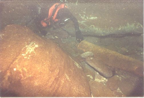 Inside the cave is one of the cannons.