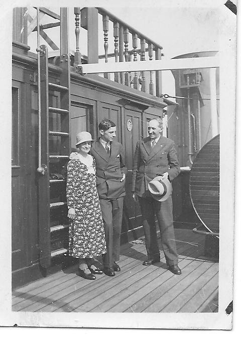 Dad with Gran and Grandad on an unidentified ship.