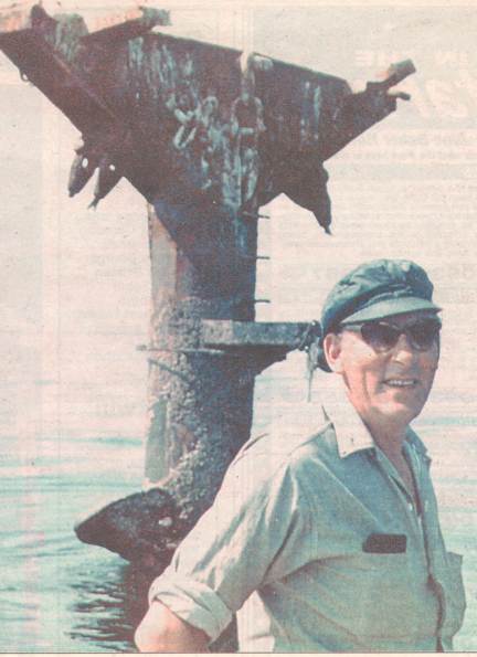 This photo shows Ken Cox in front of the mast in the 1970s.