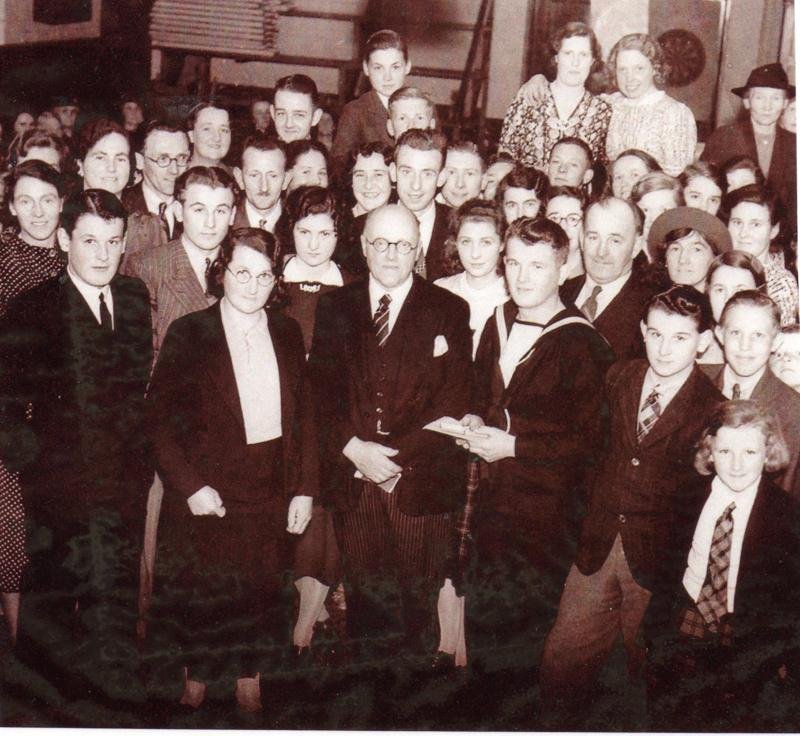 Les Smale at his presentation,just on his right is his girlfriend Barbara, who he later married. Photo supplied by Les Smale B.E.M