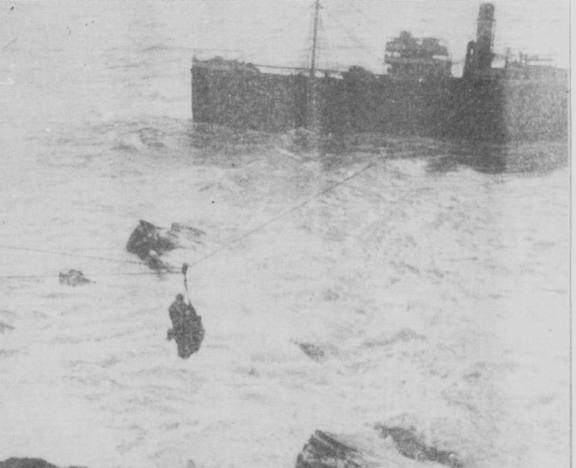 Some of the crew being rescued.