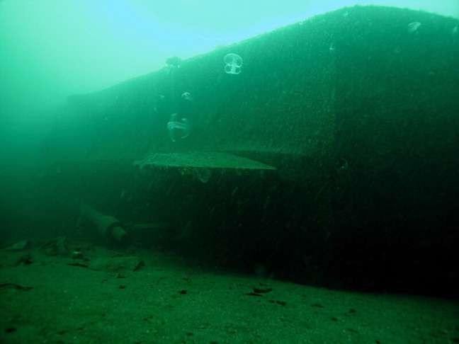 Stern showing prop shaft and rudder.