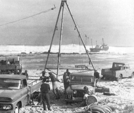 You can just see the wreck in the background. Photo Ferguson Collection.