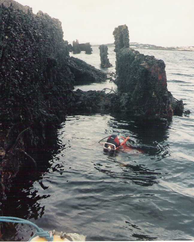 The Wreck is lying with one side showing.