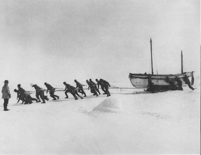 Hauling the boats across the pack ice. Photo Frank Hurley