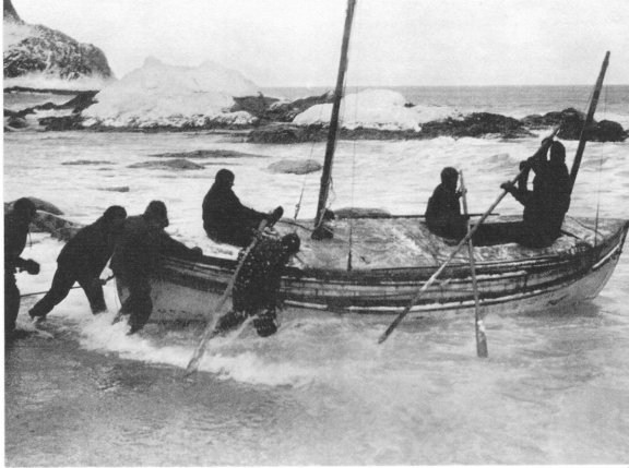 Launching the James Caird. Photo Frank Hurley.