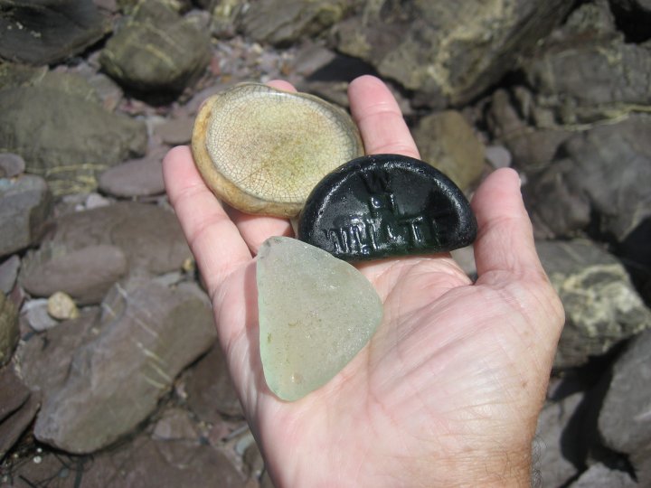 Pieces of iron and pottery.